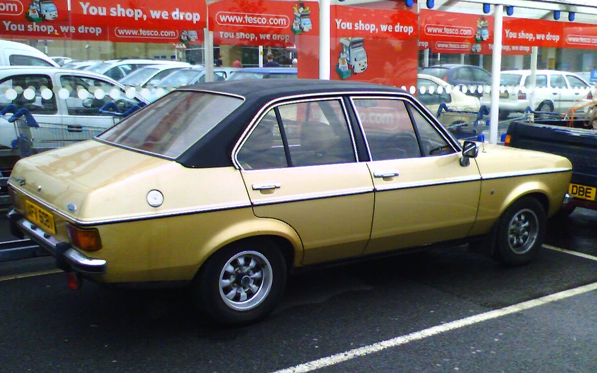 1200px-1980_Ford_Escort_Ghia.jpg